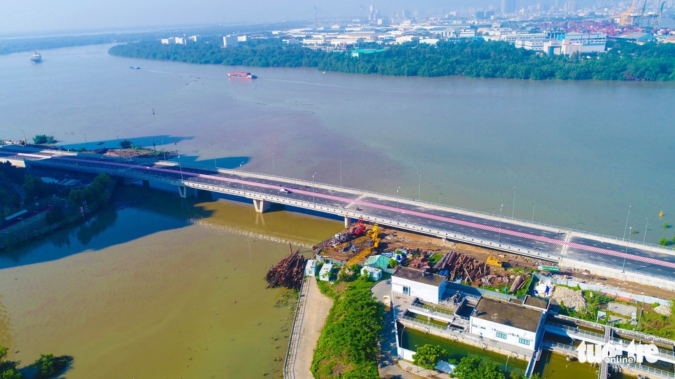 TP.HCM thông xe cầu qua đảo Kim Cương - Ảnh 13. TP.HCM thông xe cầu qua đảo Kim Cương - Ảnh 13.