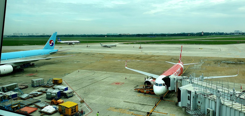 Chuyến bay hạ cánh khẩn cấp ở Tân Sơn Nhất do pin dự phòng nổ, hành khách có lỗi? - Ảnh 1. Chuyến bay hạ cánh khẩn cấp ở Tân Sơn Nhất do pin dự phòng nổ, hành khách có lỗi? - Ảnh 1.