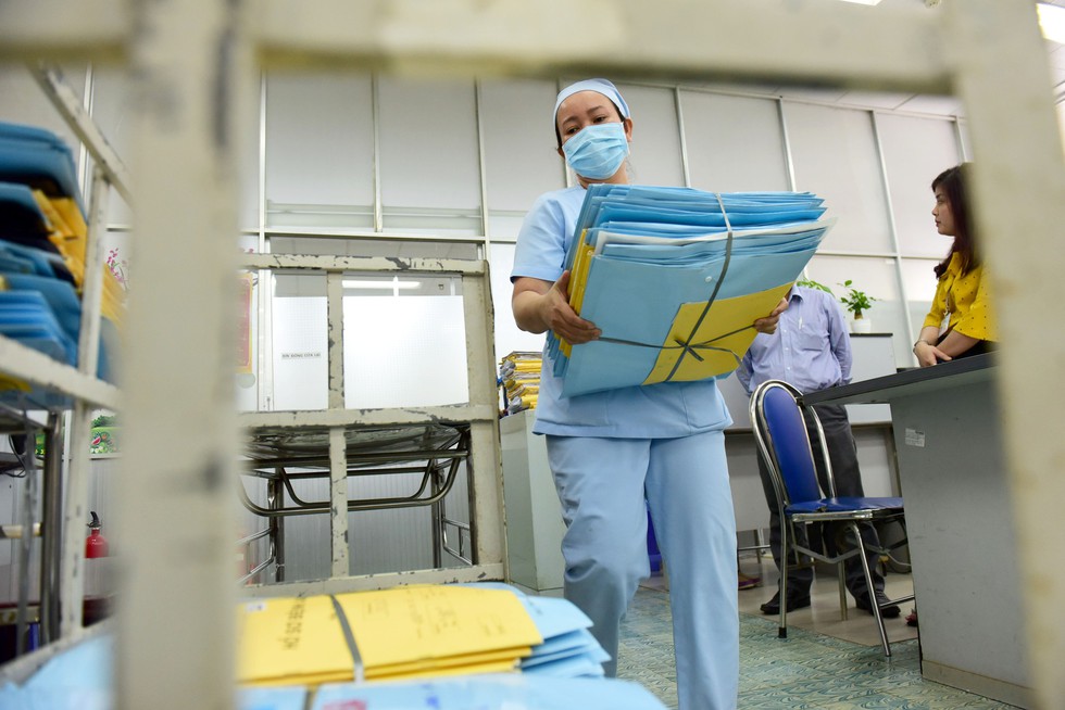 Trước bệnh án điện tử, xem hành trình của một bệnh án... giấy - Ảnh 7. Trước bệnh án điện tử, xem hành trình của một bệnh án... giấy - Ảnh 7.