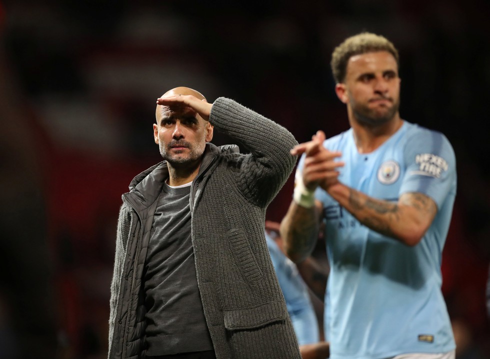 HLV Guardiola nhìn về chức vô địch sau trận derby Manchester - Ảnh 11. HLV Guardiola nhìn về chức vô địch sau trận derby Manchester - Ảnh 11.