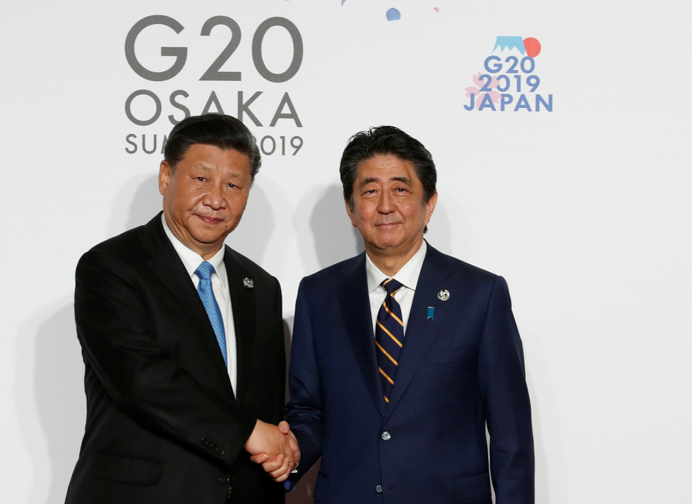 Tiết lộ hậu trường chụp ảnh gia đình G20 ở Osaka - Ảnh 5. Tiết lộ hậu trường chụp ảnh gia đình G20 ở Osaka - Ảnh 5.
