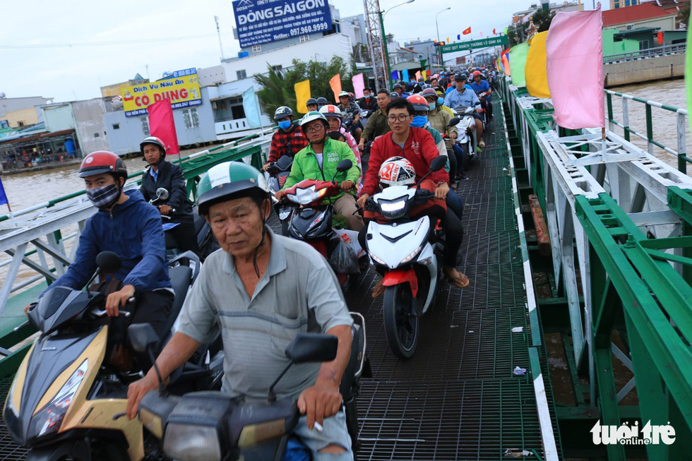 Dòng người nối hàng dài quay lại Sài Gòn sau lễ 2-9 - Ảnh 4. Dòng người nối hàng dài quay lại Sài Gòn sau lễ 2-9 - Ảnh 4.