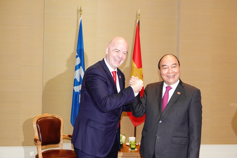 Chủ tịch nước Nguyễn Xuân Phúc gặp Chủ tịch FIFA Gianni Infatino - Ảnh 1. Chủ tịch nước Nguyễn Xuân Phúc gặp Chủ tịch FIFA Gianni Infatino - Ảnh 1.