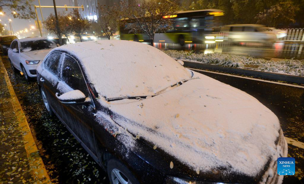 Tuyết đầu mùa ở Bắc Kinh đến sớm, nhiệt độ xuống thấp kỷ lục trong 10 năm - Ảnh 5.