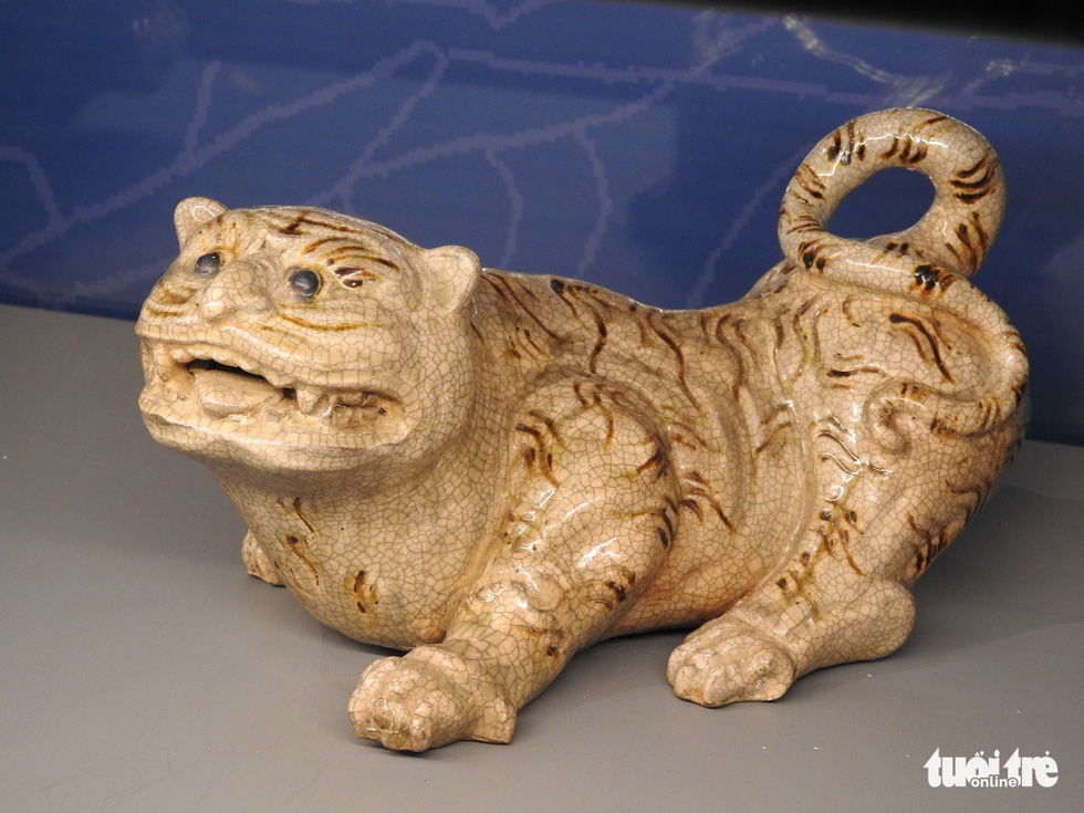 How has the tiger changed in more than 2,000 years of Vietnamese art?  - Photo 8.