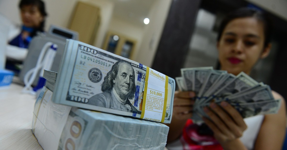 Giá USD tự do vọt lên 23.100 đồng/USD Giá USD tự do vọt lên 23.100 đồng/USD
