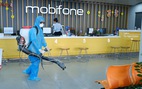 Mobifone khu vực 3 phát khẩu trang, khử trùng cửa hàng giao dịch phòng virus corona