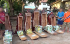 Hơn 230kg ma túy giấu trong tượng gỗ từ Lào về Việt Nam