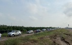Quốc lộ 1 kẹt xe, xe cộ hỗn loạn chạy vào cao tốc Trung Lương - Mỹ Thuận