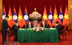 Tổng bí thư hai nước Việt, Lào chứng kiến lễ ký các văn kiện hợp tác