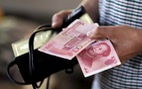 Trung Quốc tăng nhẹ giá đồng nhân dân tệ