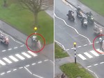 Đoàn biker dừng xe giúp người phụ nữ sang đường