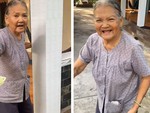 Bà nội chạy theo dúi vào tay cháu ít tiền để ăn bánh