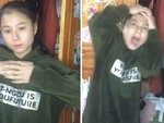 Cô gái xinh đẹp va đầu vào cửa tủ khi mải quay video sống ảo