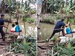 Cả nhà 'cười bể bụng' trước màn ông đưa cháu qua kênh bằng cáp treo