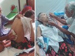 Cụ ông ân cần chăm sóc vợ ốm