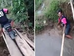 Cười xỉu với chàng trai chạy xe máy qua cầu bị ngã xuống mương