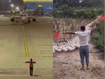 Chàng trai đưa vịt vào chuồng phong cách 'hướng dẫn dừng máy bay'