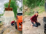 Chàng trai cười khoái chí khi tài xế máy xúc cho gáo nước khổng lồ