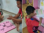 Bé trai ngoan ngoãn vào làm bài tập vì quay vào ô đi học