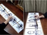 Họa sĩ một tay vẽ 5 bức tranh dân cùng lúc