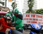 "Thằng hâm" chạy Grab miễn phí khắp Sài Gòn