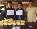 Phối hợp bắt nóng bên Lào hai tên thủ súng, mang theo 118.000 viên ma túy