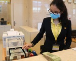 Lãi suất ngân hàng tiếp tục giảm nhờ huy động vốn tăng