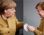 Khoảnh khắc đáng yêu khi bà Merkel 