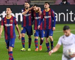 Messi lập cú đúp đưa Barca bám sát Atletico Madrid