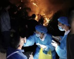 Dân Trung Quốc phải chờ xét nghiệm COVID-19 gần đám cháy rừng