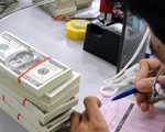 Tỷ giá tăng 1%, nợ VN tăng 10.000 tỷ