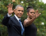 Vợ chồng Obama viết hồi ký kiếm 60 triệu USD
