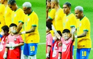 Bé trai Hàn Quốc sung sướng khi được Neymar xoa bóp vai