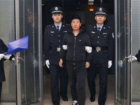 Quan tham Trung Quốc trốn ra nước ngoài sẽ bị xét xử vắng mặt