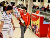 Những hành khách cuối rời Tân Sơn Nhất, đón giao thừa 