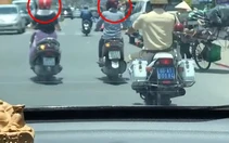 Hai nữ 'ninja' bật đèn xi nhan khiến CSGT bối rối