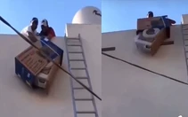 2 người đàn ông thẩn thờ khi làm vỡ máy điều hòa