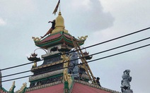 Một thanh niên nghi ‘ngáo đá’ quậy trên nóc chùa gần 10 giờ