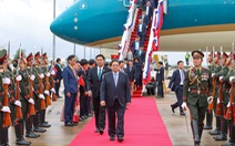 Thủ tướng Phạm Minh Chính đến Lào, bắt đầu chuyến thăm chính thức