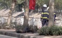Người phụ nữ dùng xăng tự thiêu trên phố Hà Nội