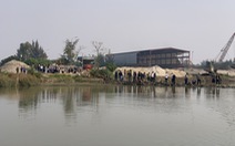 Hai học sinh trượt chân xuống sông Ninh Cơ mất tích
