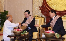 Lào làm nghi lễ buộc chỉ cổ tay cho Chủ tịch nước Võ Văn Thưởng