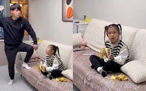 Con gái ngơ ngác khi bố làm 'ảo thuật' ăn mất quả chuối