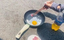 Trời nắng nóng, người Quảng Nam 'dí dỏm' mang chảo ra đường rán trứng