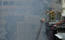 Hong Kong truy lùng nghi can gây cháy chợ