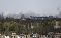 ​Đạn pháo rơi trúng trường học ở Donetsk, 10 người chết