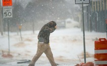 Nhiều bang của Mỹ tơi bời trong mưa tuyết, lũ lụt