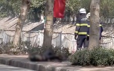 Người phụ nữ dùng xăng tự thiêu trên phố Hà Nội