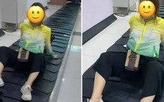 Khách nữ làm hành động lạ trên băng chuyền hành lý sân bay
